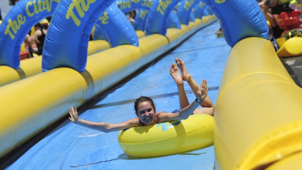 The City Slider, a 325 metre long water slide set up on Cohen Street, Belconnen, was a hit with the thousands of people that used it in the 30 degree heat.