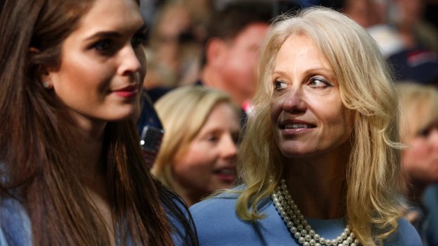 Kellyanne Conway, campaign manager for Republican presidential candidate Donald Trump, right, and press secretary Hope Hicks watch during a campaign rally in Charlotte, North Carolina.