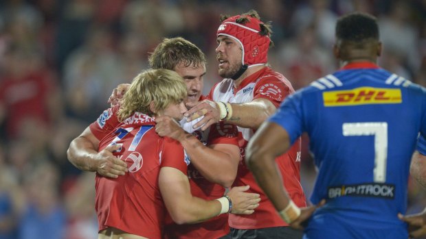 Match winner: Faf de Klerk celebrates his try with Lions teammates during the Super Rugby match against the Stormers at Johannesburg.