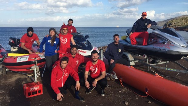 St Kilda surf lifesaver Simon Lewis and his team with the newly-purchased jet-ski and the Centifloat.