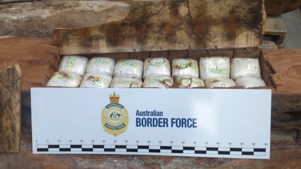 Some of the 154 kilogram of  methamphetamine hidden in a shipment of timber.