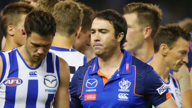 Kangaroos coach Brad Scott with his team at three-quarter time when they were trailing Adelaide by a point.