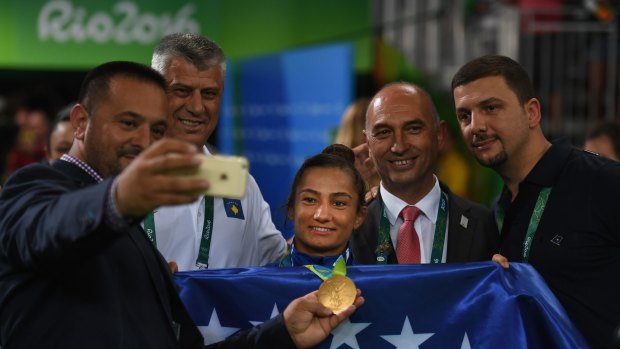 Majlinda Kelmendi is the centre of attention after the medal presentation at Carioca Arena 2 on August 7.