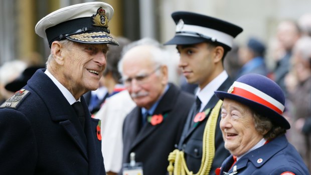Prince Philip meets veterans and members of the armed services during a visit to the Field of Remembrance at Westminster Abbey in London in 2015.