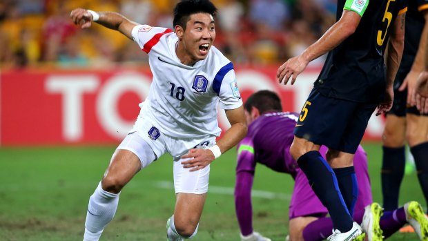 South Korea's Lee Jeong-hyeop reacts after scoring against Australia in the group encounter.