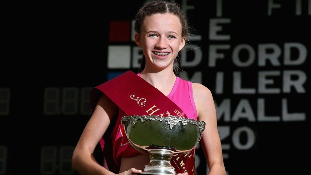 Last year's winner Talia Martin with the Stawell Gift trophy.