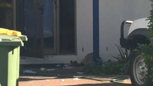 Neighbours reportedly sat with the woman near her front door until emergency services arrived.