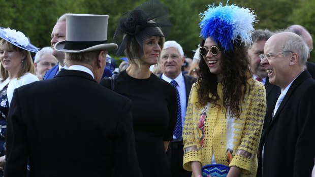 Prince Philip, left, meets British singer Eliza Doolittle (second right).