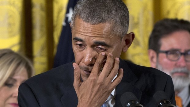 President Barack Obama wipes tears from his eyes as he speaks in the White House on Tuesday, about his determination to address gun violence. 