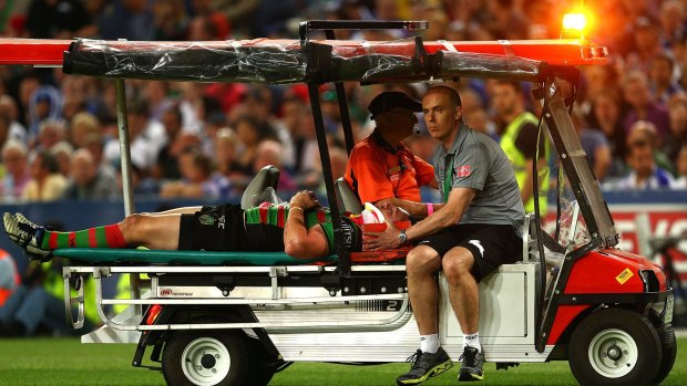 Dave Tyrrell of the Rabbitohs is stretchered from the field in the NRL grand final.