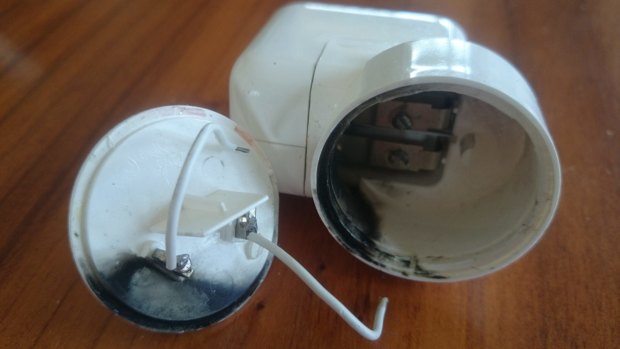 Peter Neumeister's broken Apple wall adapter caused an electric spark.