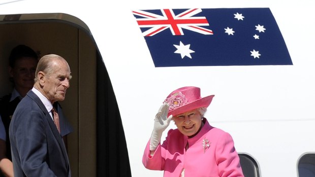 Silent Knight ... Britain's Queen Elizabeth II, right, and her husband Prince Philip have been tight-lipped about his Australian knighthood.