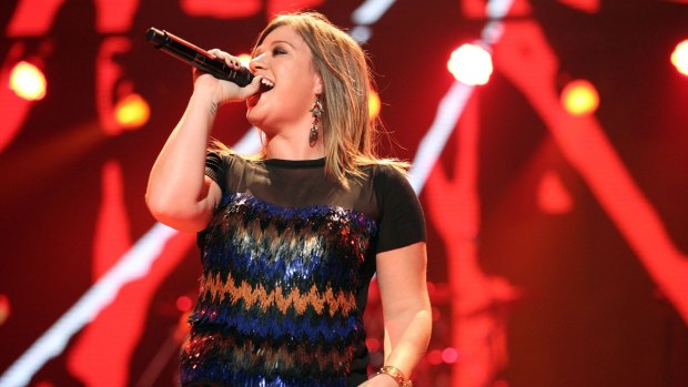 Kelly Clarkson, the original <i>American Idol</i> winner, came back to the reality show to be a mentor for other performers. 