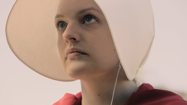 Offred (Elisabeth Moss) in "The Handmaid's Tale", a dystopian world in which fertile women are enslaved as child breeders. 