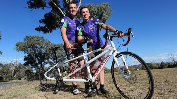 Blind brothers Lorin (left) and Dean Nicholson at a rest stop in New South Wales as they pedalled from Perth to Sydney in 2010.