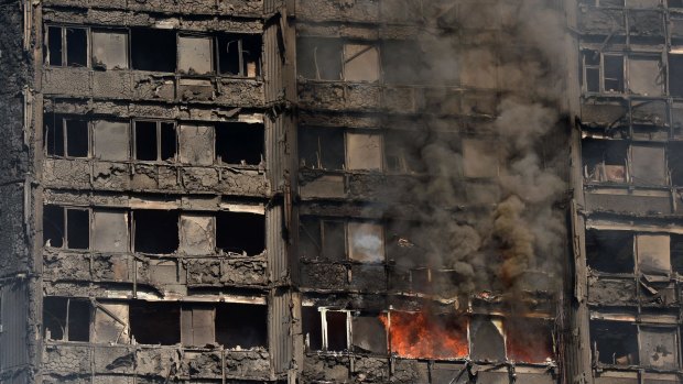 Fires continued to rage in the Grenfell Tower block in London well into the next day.