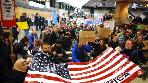 Sit down: A demonstration against Donald Trump's executive order on immigration at Seattle-Tacoma International Airport.