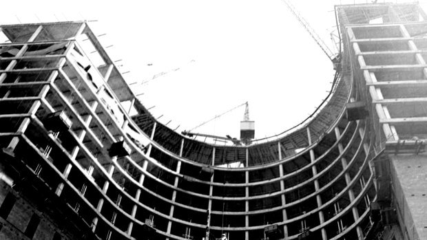 Dogman Ron Keyes is pictured aloft during construction of the Wentworth Hotel in Sydney on 9 June 1965.