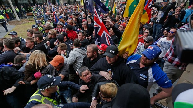 United Patriot Front supporters and counter-protesters clash in Bendigo on Saturday. 