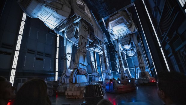 Guests will board trackless vehicles that twist and turn throughout the hallways of a Star Destroyer, even under or around towering AT-ATs.