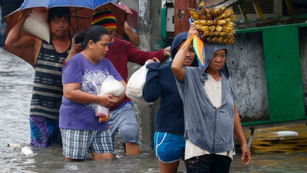 Talim, named in the Philippines as "Maring", saw authorities suspend classes and some government offices to close in affected areas, including metropolitan Manila.