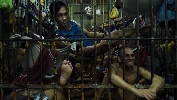 Accused drug dealers and users inside an overcrowded cell at Manila Police Headquarters.