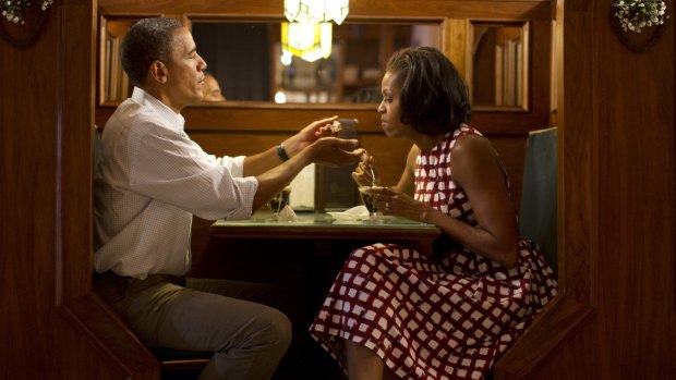 President Barack Obama and wife Michelle take a brief break for ice-cream after speaking at a campaign rally in Davenport, Iowa, 2013. Courtesy and copyright the artist.