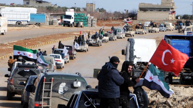 Turkey-backed FSA fighters ready for an offensive in Azez near the border with Turkey on Friday.