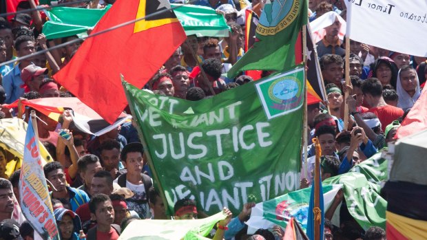 Protesters in Dili last month demanded that Australia negotiate over the Timor Sea boundary.