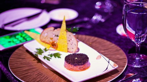 Wild salmon tartare with imperial caviar, by chef Joel Robuchon, is served as the first course during the inaugural Michelin Guide Singapore 2016 Awards Ceremony.