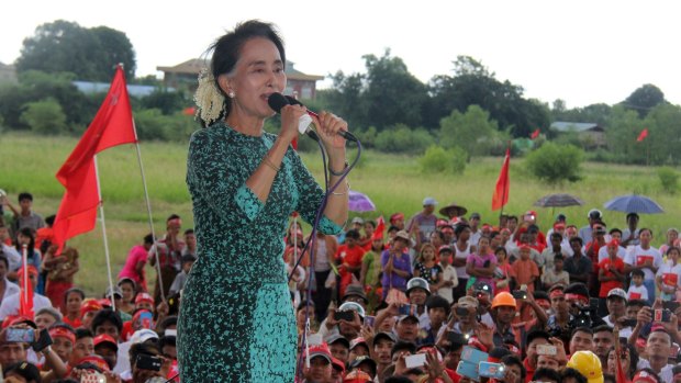 Myanmar opposition leader Aung San Suu Kyi making a speech to party faithful on the outskirts of Yangon on Sunday. 