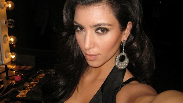 Serious face: One of many selfies of Kim Kardashian..