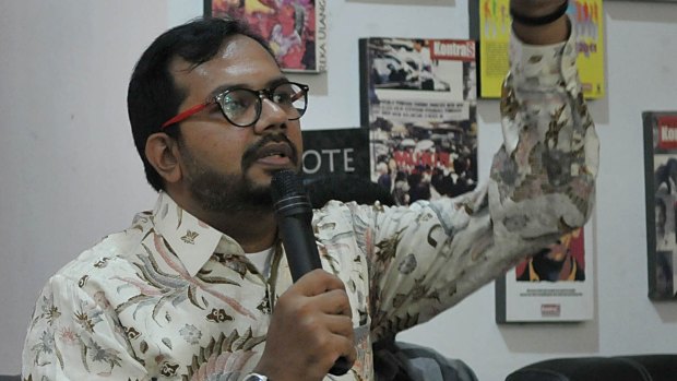 Haris Azhar at Kontras during a press conference. 