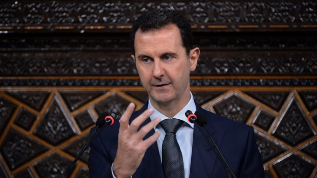 Syrian President Bashar al-Assad, addressing Syria's newly-elected parliament in Damascus on Tuesday. 