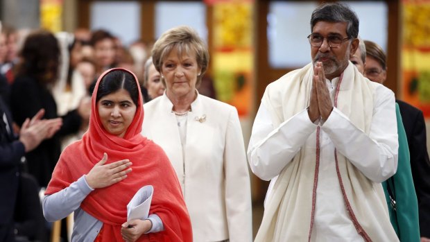 Nobel peace prize winners Malala Yousafzai and Kailash Satyarthi arrive at the ceremony.