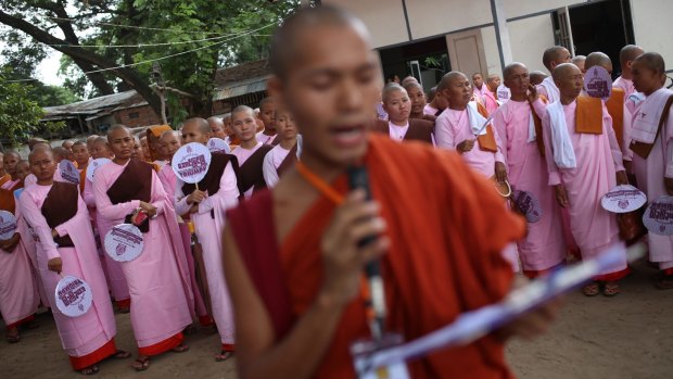 Buddhist monks and nuns celebrate newly-imposed restrictions on interfaith marriages in Mandalay.