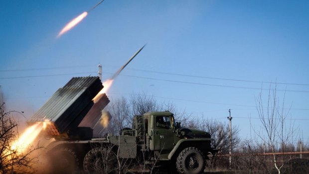 Pro-Russian rebels stationed in the eastern Ukrainian city of Gorlivka, Donetsk region, launch missiles from a Grad launch vehicle toward a position of the Ukrainian forces  in Debaltseve, about 35km east of Gorlivka.