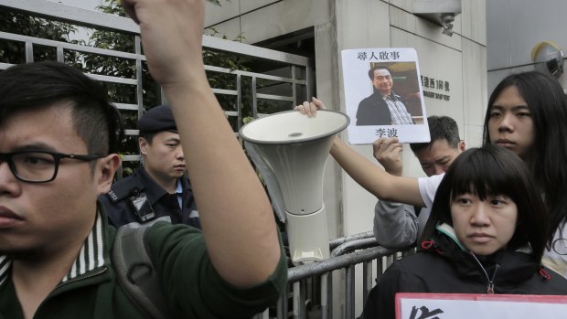 A protest demanding the resolution of the missing booksellers saga, outside the Liaison of the Central People's Government in Hong Kong last month. 