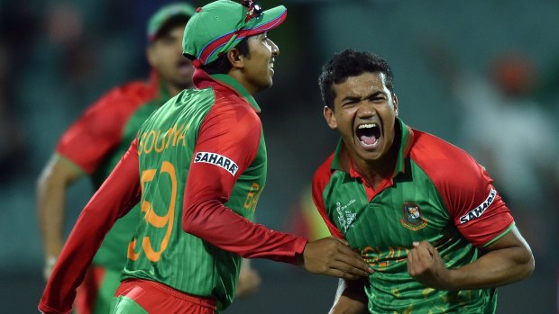 Bangladesh paceman Taskin Ahmed celebrates after taking the wicket of England's James Taylor.