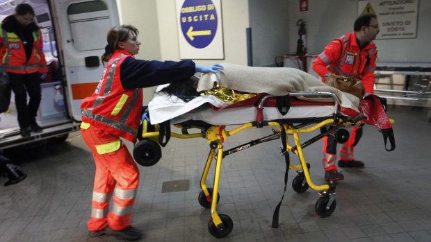 A rescued passenger from the ferry arrives at a hospital in Brindisi, Italy.