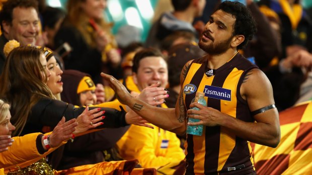 Left it late: Cyril Rioli's set shot with 77 seconds left on the clock saw the Hawks seal a memorable five-point win over Sydney in Round 17.