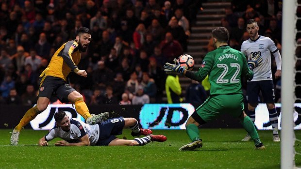 Late show: Olivier Giroud secures Arsenal the win late against Preston North End.