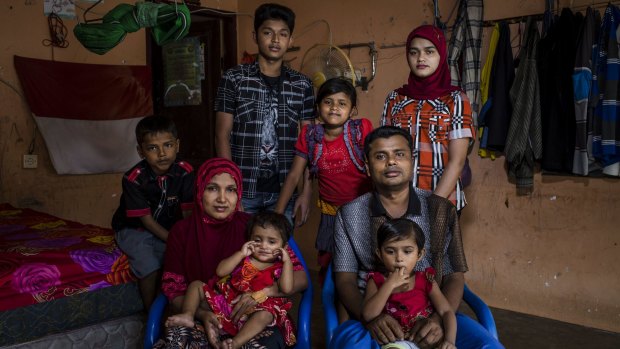 A Rohingya refugee family Muhammad Rofiq, mother Hamidah and their children in a refugee camp in Medan, North Sumatra, Indonesia. 