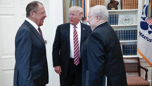 Only hours after dismissing James Comey as director of the FBI in May 2017, US President Donald Trump met with Russian Foreign Minister Sergey Lavrov, left, and Moscow's ambassador to the US, Sergei Kislyak.