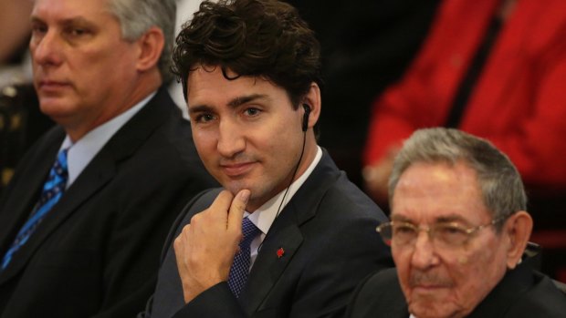 Canadian Prime Minister Justin Trudeau, centre, sits with Raul Castro and Cuba's First Vice-President Miguel Diaz-Canel Bermudez, left, at Havana University earlier this month.