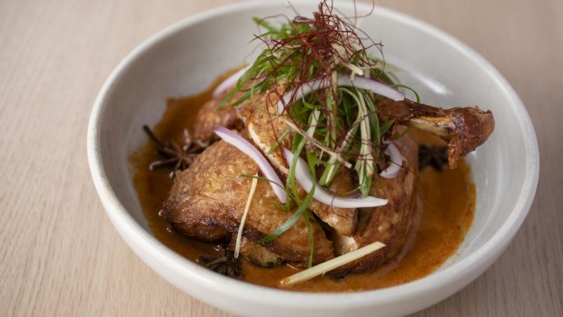 Go-to dish: Crisp-skin corn-fed master-stock chicken with ginger, chilli and satay sauce.
