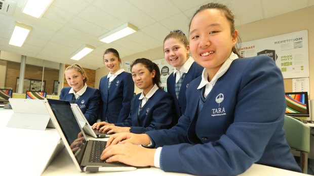 Students (from left) Sarah Vandebberg, Georgia Grasso, Angie Liu, Erika Dudkin and Alice Shang at Tara Anglican girls school learn to code.