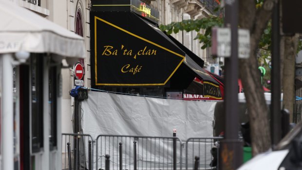 The scene outside the Bataclan theatre the morning after terrorists shot over 100 people.