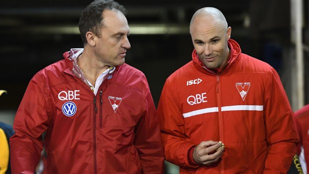 Swans coach John Longmire with Tom Harley, who will become the club's CEO at the end of next year.
