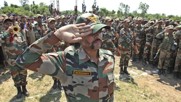 Indian army soldiers pay tribute to their colleague Randeep Singh.